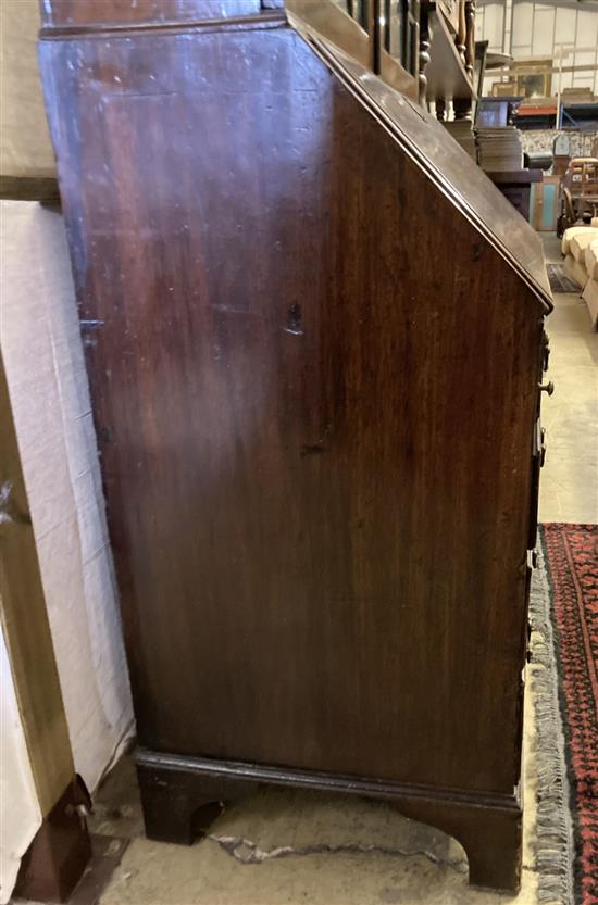 A George III mahogany bureau bookcase, width 100cm, depth 52cm and 26cm top, height 221cm